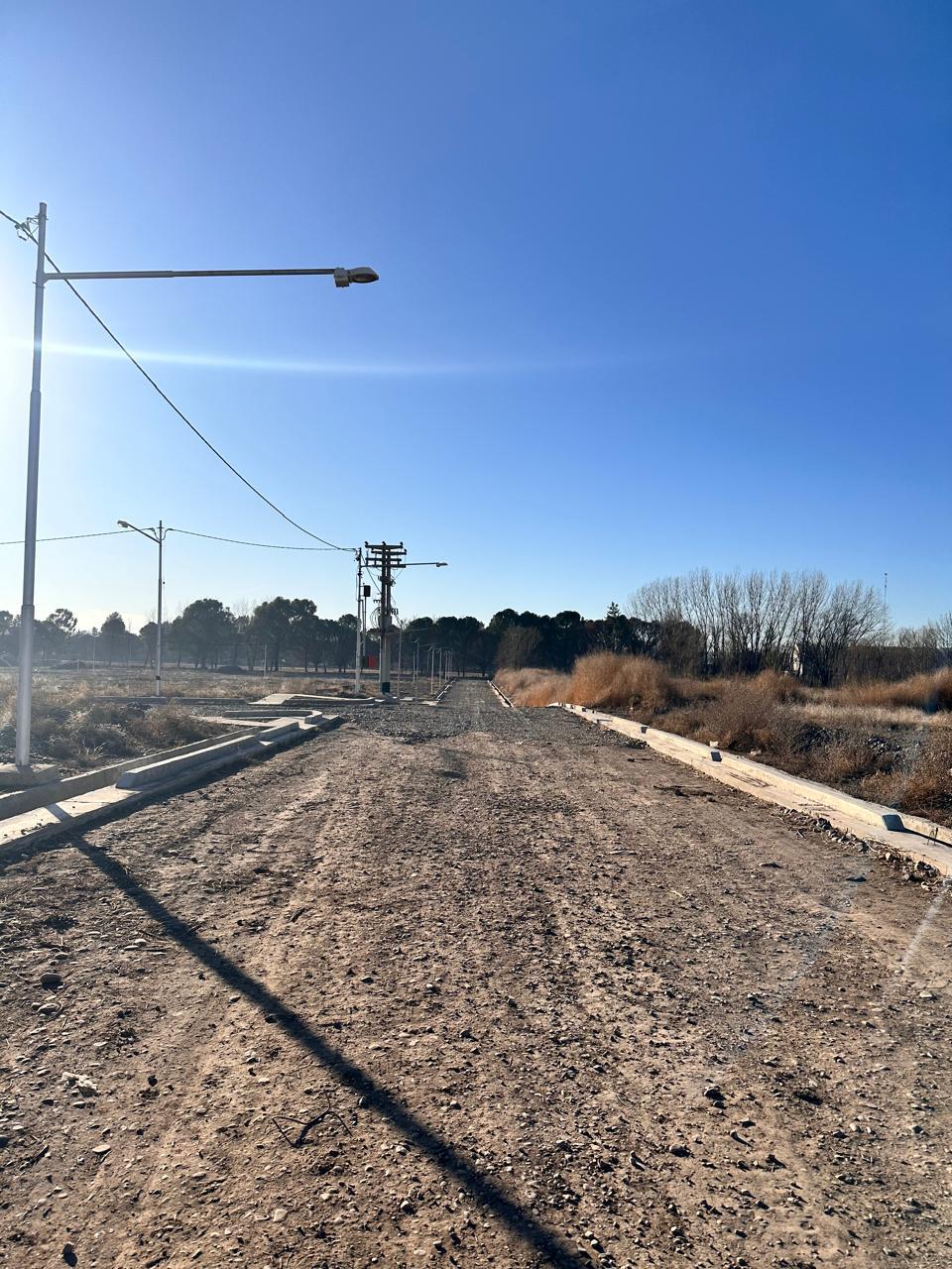 Loteo Eibar &mdash; Calle de loteo con luz solar